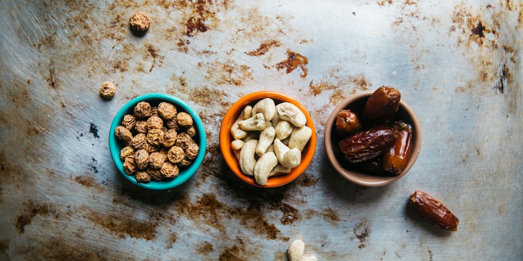 three bowls of nuts